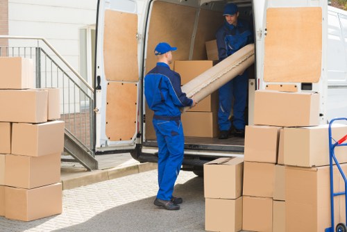 Office removals team planning a business move in Bow