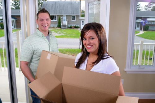 Packing and loading household items for removal services in Bow