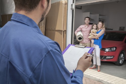 Bow house removalists unloading boxes into a new East London home