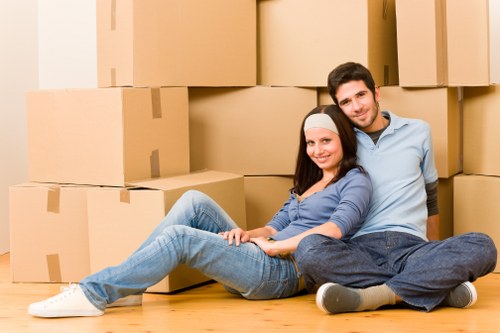 Packed household furniture ready for transport during a Bow removals service