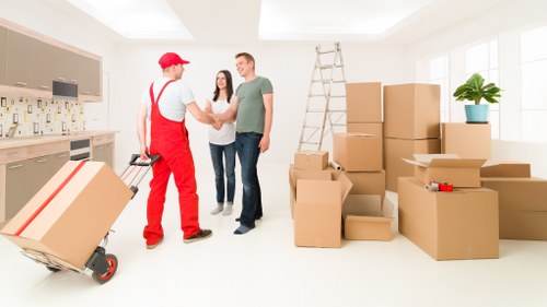 House removals support for a Bow home with furniture and boxes