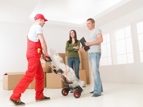 Moving team preparing for a small business transport job in Bow