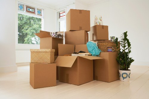 Careful wrapping and protection used during a piano move in East London