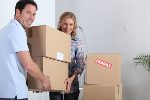 Packing boxes and preparing for a removal van move in Bow